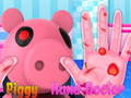 Permainan Piggy Hand Doctor 